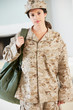 Photo: Female Soldier With Kit Bag Home For Leave Female Soldier With Kit Bag Home For Leave