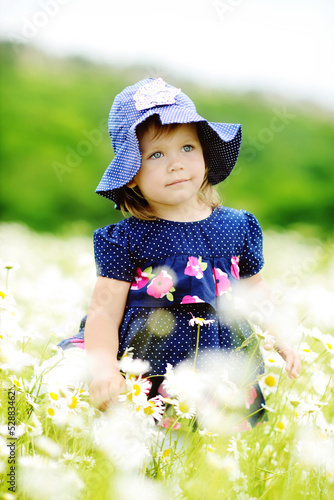 Photo: sweet toddler in daisy field sweet toddler in daisy field