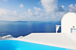 Swimming pool overlooking the caldera in Oia