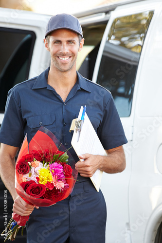Photo: Portrait Of Delivery Driver With Flowers Portrait Of Delivery Driver With Flowers