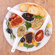 assortment of tapenade and bread