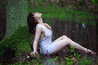Beautiful passionate woman in the forest