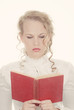 Photo: woman reading romantic book woman reading romantic book