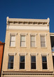 Brown Stone Building with Window Trim