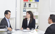 Foto: man explaining about her profile to business managers at a job i man explaining about her profile to business managers at a job i