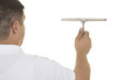 Photo: hand with window cleaning tool hand with window cleaning tool