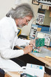 technician engineer at work with microchip
