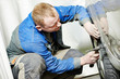 auto repair man flatten metal body car