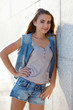 girl standing near wall