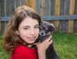 Beautiful kid girl portrait with puppy chihuahua doggy