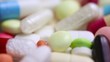 Closeup Of Medical Pills Turni...