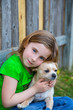 Blond happy girl with her chihuahua doggy portrait
