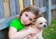 Photo: Blond happy girl with her chihuahua doggy portrait Blond happy girl with her chihuahua doggy portrait