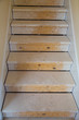 Foto: Wooden stairs in new house construction Wooden stairs in new house construction