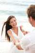Beach summer vacation fun with playful couple