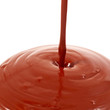 Chocolate flow isolated on white background close up