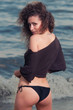 Photo: woman in a bathing suit woman in a bathing suit