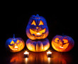 Halloween pumpkins glowing inside