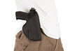 Close-up of a man with holster and a gun