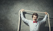 Businessman holding rope