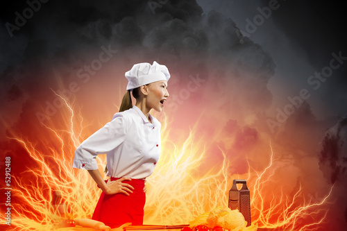 Photo: Asian female cook in anger Asian female cook in anger