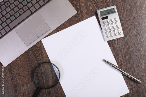 Photo: Businessman workplace with papers Businessman workplace with papers