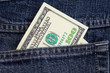 Foto: dollars in a jeans pocket dollars in a jeans pocket