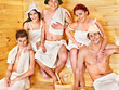 Group people in Santa hat  at sauna.
