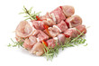 chicken skewers and rosemary close up on white
