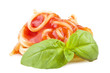 fork with spaghetti sauce and basil on white