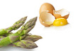 bunch of fresh asparagus and eggs close up on white