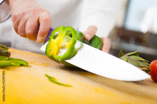 Photo: Chef at work in his kitchen Chef at work in his kitchen