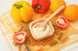 Wheat flour in wooden spoon on pasta and Spaghetti background