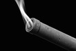smoking cannon isolated on black background
