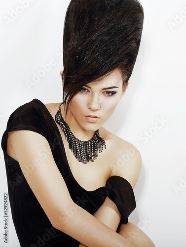 Photo: Sentiment. Bright Woman with Black Updo Hair and Necklace Sentiment. Bright Woman with Black Updo Hair and Necklace