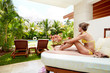 Relaxing woman at caribbean resort.