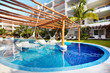 Swimming pool and hammock.