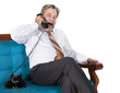 Old workaholic businessman working at night covered in his apart