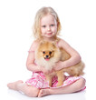 Girl And Puppy. Looking At Cam...