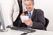 Businessman and businesswoman with tablet PC