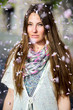 Women showered with pink petals