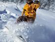 Snowboarder moving down