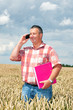 Agricultural engineer at the field inspection