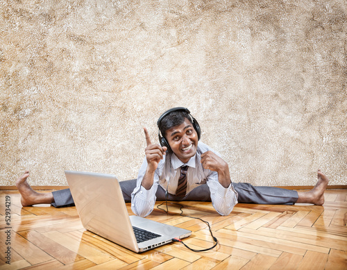 Photo: Indian man listening to the music Indian man listening to the music