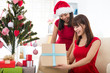 chinese girl friends during a christmas celebration