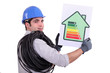 electrician holding an energy consumption label