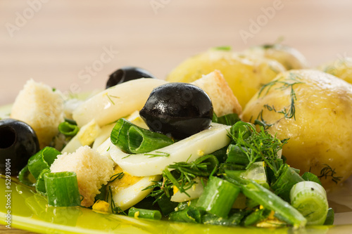 Photo: green salad with onion and squid green salad with onion and squid