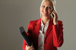 Photo: Businessfrau beim Telefonieren Businessfrau beim Telefonieren