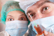 two doctors with syringe