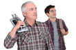 Photo: Learning with experienced tiler Learning with experienced tiler